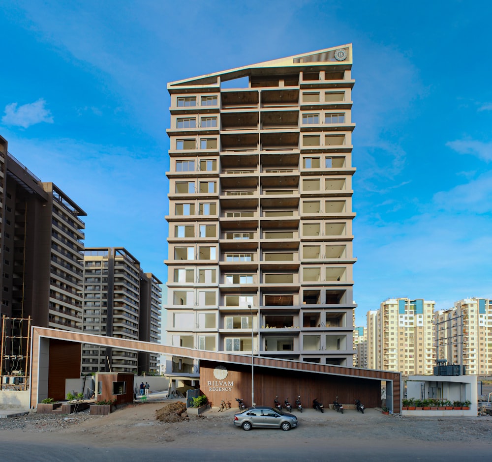Under-construction Indian residential tower with signage board